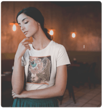 a woman wearing a t - shirt with a woman's face on it